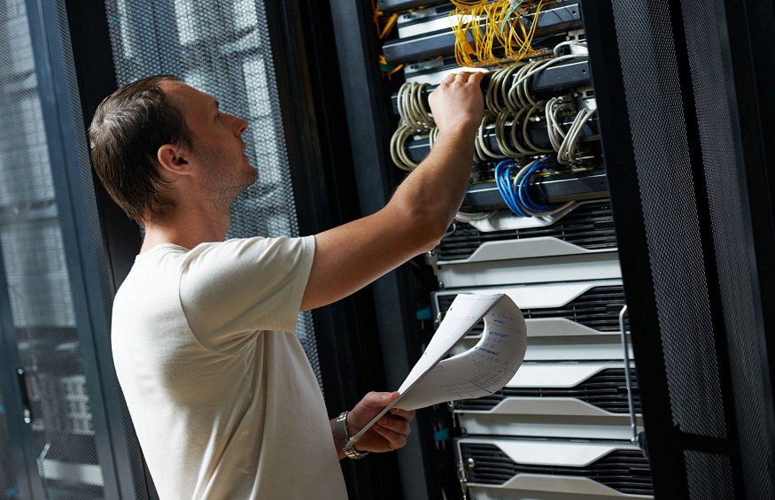 28668701 - network engineer working in server room